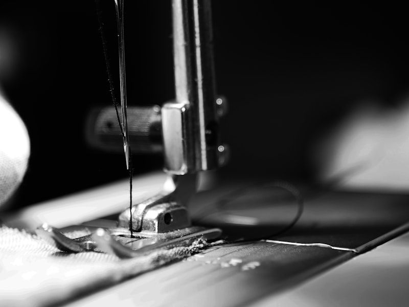 Sewing machine close-up — expert dress alterations at White Rose Bridal